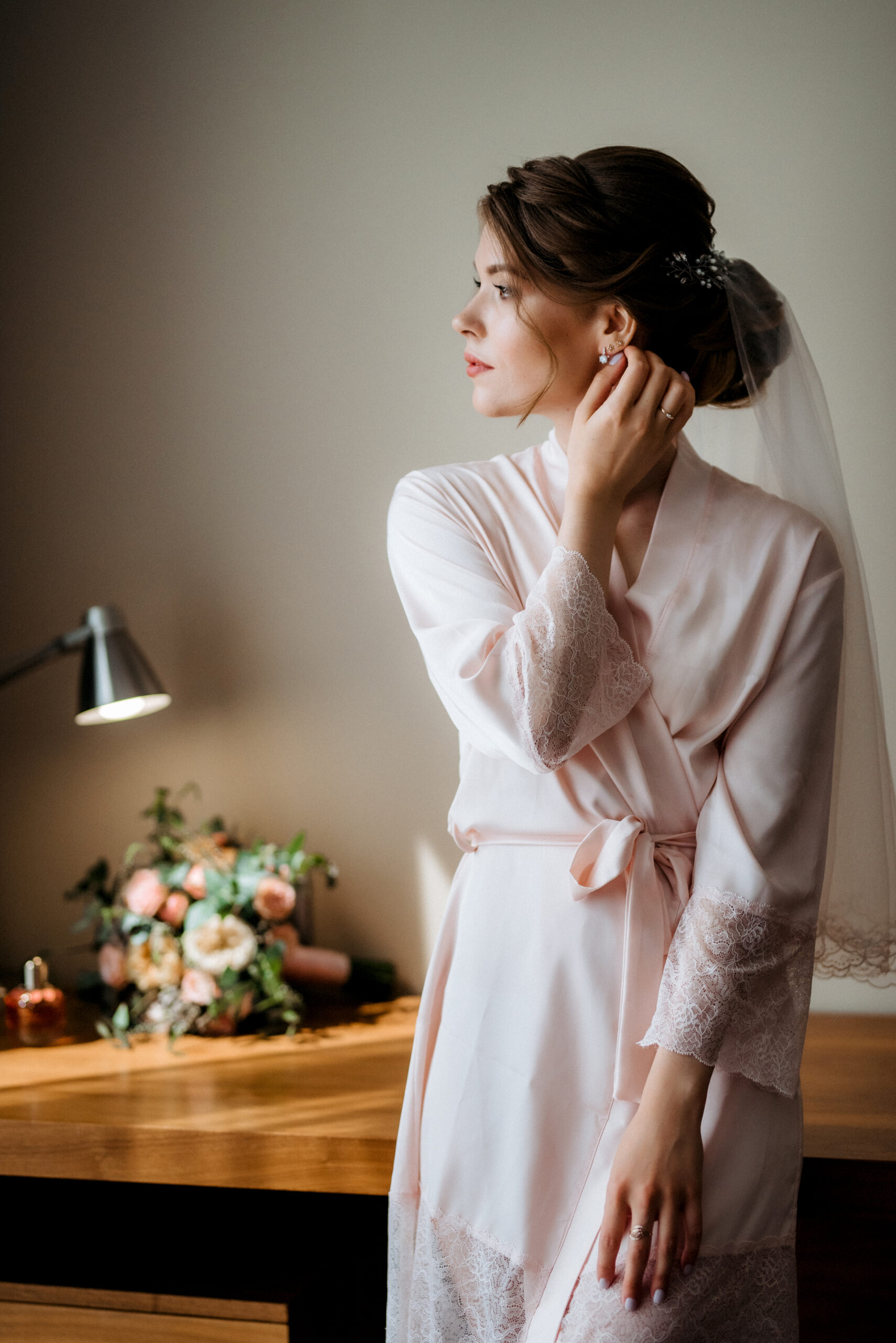 bride in a white dress at the training camp inside the hotel